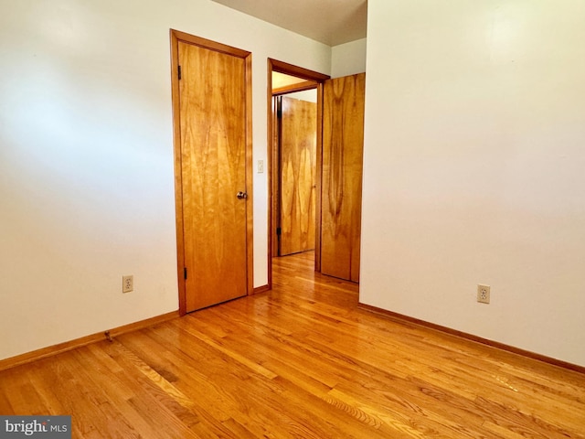 13709 Fir Tree Ln, Cresaptown, MD 21502 - spare room with light wood-style flooring and baseboards