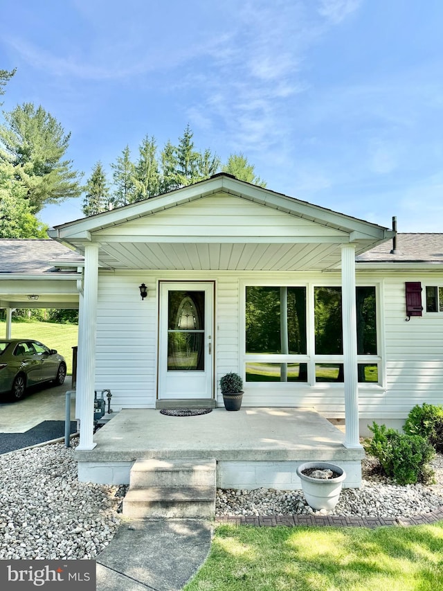13709 Fir Tree Ln, Cresaptown, MD 21502 - doorway to property with a porch and a carport