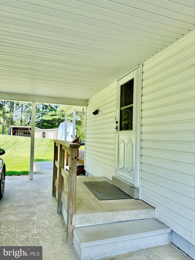 13709 Fir Tree Ln, Cresaptown, MD 21502 - view of exterior entry featuring a yard and a patio