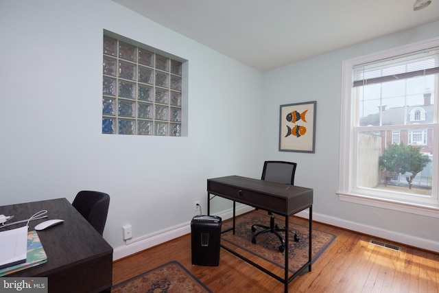 3238 P St NW, Washington, DC 20007 - office area with hardwood / wood-style floors and baseboards