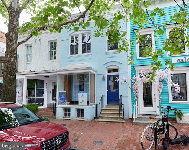 3238 P St NW, Washington, DC 20007 - view of property featuring entry steps and brick siding