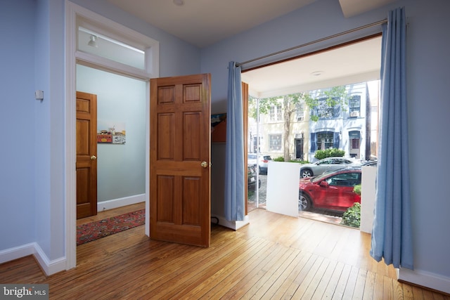 3238 P St NW, Washington, DC 20007 - entryway with wood-type flooring and baseboards
