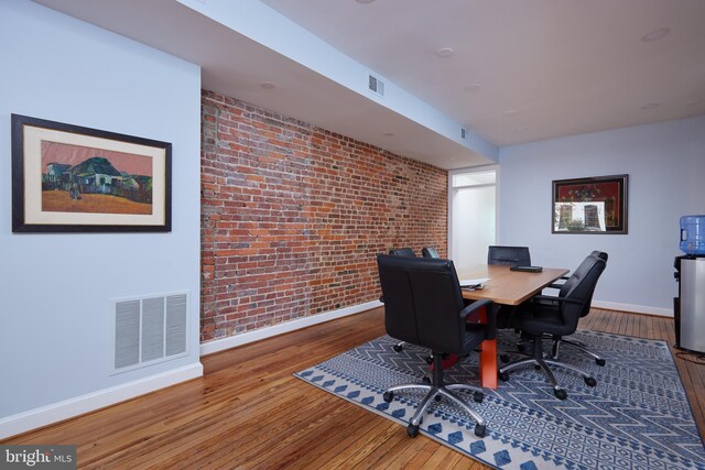 3238 P St NW, Washington, DC 20007 - office space featuring brick wall and wood-type flooring
