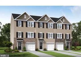 109 Zander Rd, Inwood, WV 25428 - townhome / multi-family property with a garage and driveway