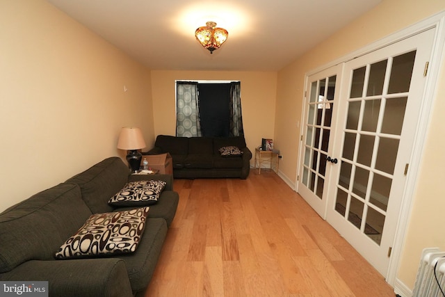 328 N Mechanic St, Cumberland, MD 21502 - living area with wood finished floors and french doors