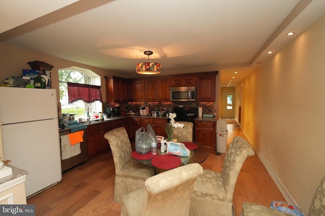328 N Mechanic St, Cumberland, MD 21502 - dining room with light wood finished floors and recessed lighting