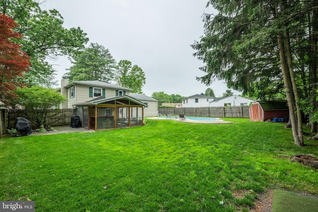215 Murray Dr, Doylestown, PA 18901 - fenced backyard with a sunroom and a storage unit