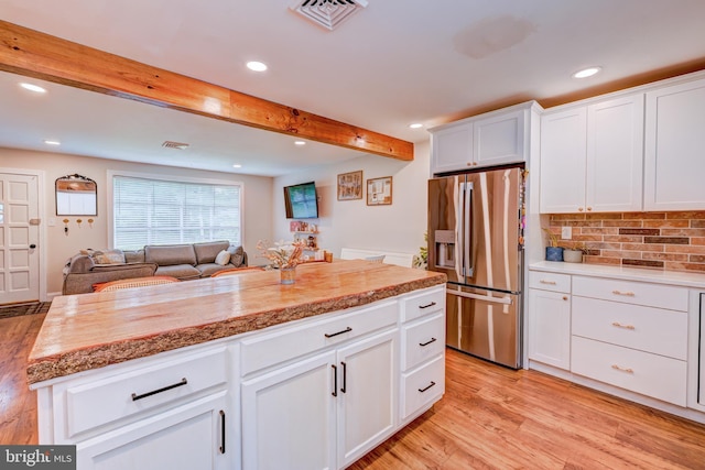 215 Murray Dr, Doylestown, PA 18901 - kitchen featuring stainless steel fridge with ice dispenser, recessed lighting, light wood finished floors, light countertops, and beamed ceiling
