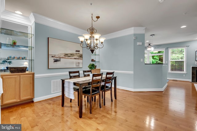 810 Broken Twig Ct, Odenton, MD 21113 - dining area with crown molding, a ceiling fan, light wood finished floors, recessed lighting, and a chandelier