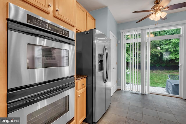 810 Broken Twig Ct, Odenton, MD 21113 - kitchen with stainless steel appliances, a ceiling fan, tile patterned floors, and light brown cabinetry