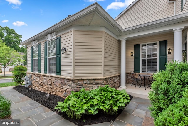 810 Broken Twig Ct, Odenton, MD 21113 - view of property exterior with stone siding and covered porch
