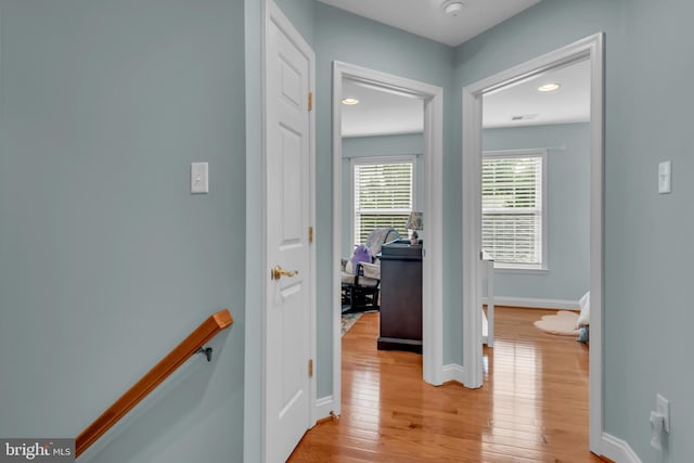 810 Broken Twig Ct, Odenton, MD 21113 - corridor with light wood-type flooring and an upstairs landing