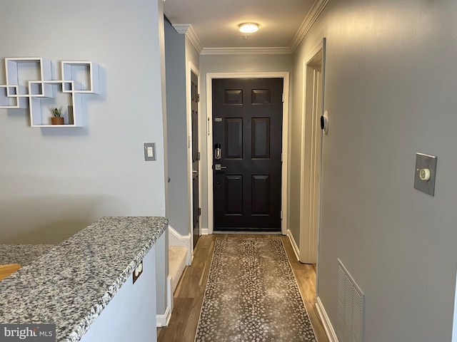 8 Tyler Falls Ct Unit C, Baltimore, MD 21209 - entryway featuring wood finished floors and crown molding
