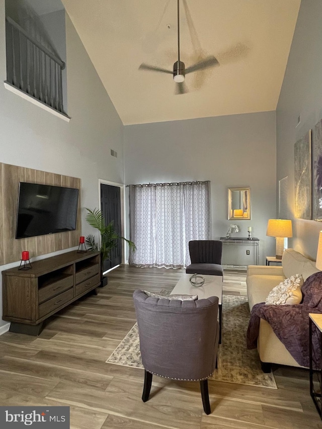 8 Tyler Falls Ct Unit C, Baltimore, MD 21209 - living room featuring high vaulted ceiling, ceiling fan, and wood finished floors