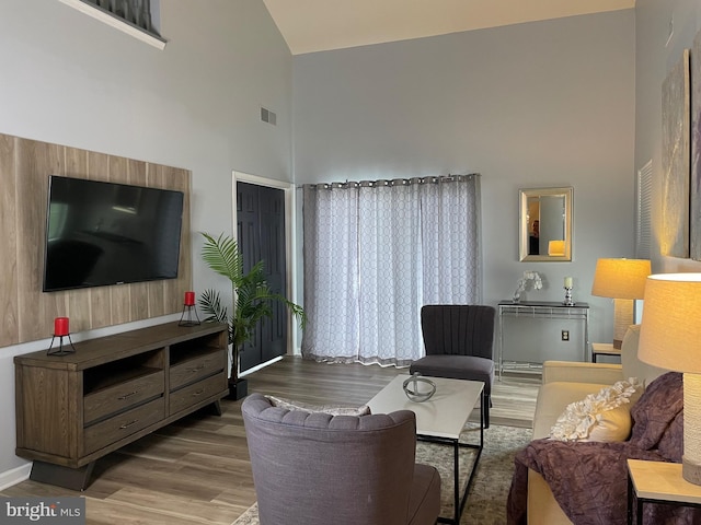 8 Tyler Falls Ct Unit C, Baltimore, MD 21209 - living room featuring high vaulted ceiling and wood finished floors