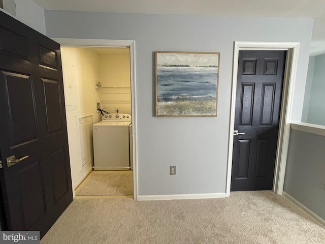 8 Tyler Falls Ct Unit C, Baltimore, MD 21209 - laundry room featuring washer / dryer and light carpet