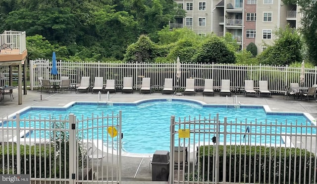 8 Tyler Falls Ct Unit C, Baltimore, MD 21209 - community pool featuring a patio area