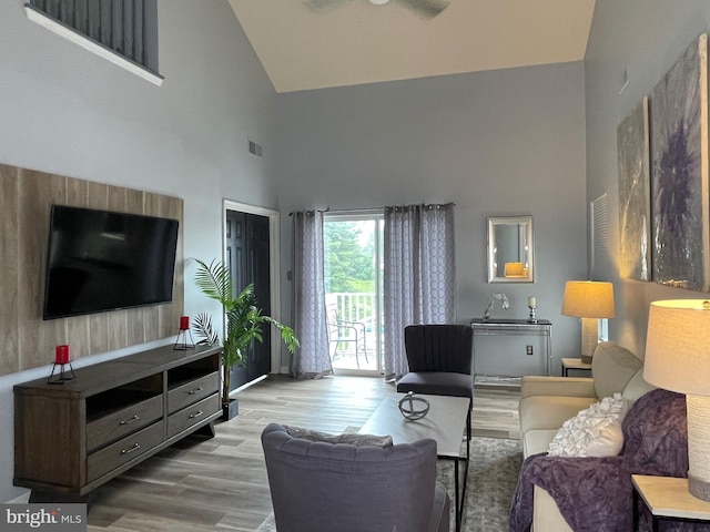 8 Tyler Falls Ct Unit C, Baltimore, MD 21209 - living area featuring high vaulted ceiling and wood finished floors