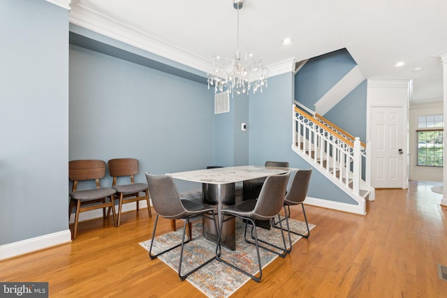 2009 Magarity Ct, Falls Church, VA 22043 - dining area featuring ornamental molding, a chandelier, stairway, wood finished floors, and recessed lighting