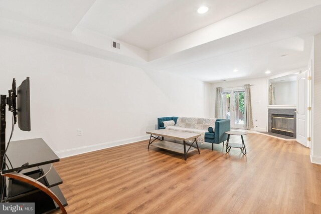 2009 Magarity Ct, Falls Church, VA 22043 - sitting room with light wood-type flooring, recessed lighting, and a glass covered fireplace