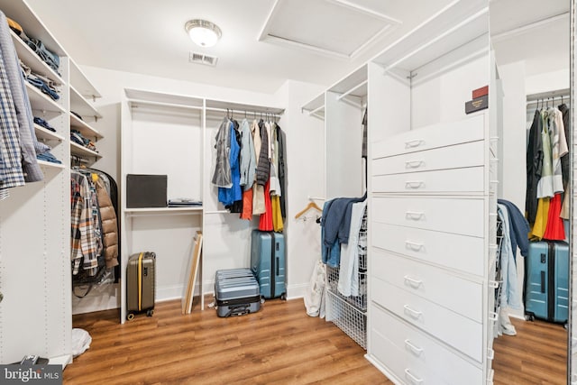 2009 Magarity Ct, Falls Church, VA 22043 - walk in closet featuring attic access and wood finished floors