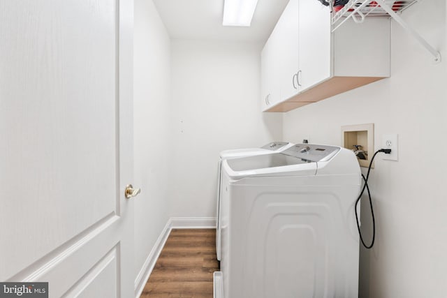 2009 Magarity Ct, Falls Church, VA 22043 - laundry area featuring cabinet space, washing machine and clothes dryer, and wood finished floors