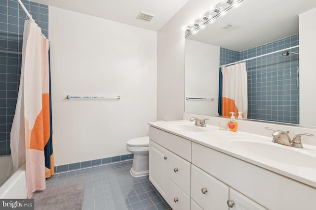 2009 Magarity Ct, Falls Church, VA 22043 - bathroom featuring tile patterned floors, double vanity, and shower / tub combo with curtain