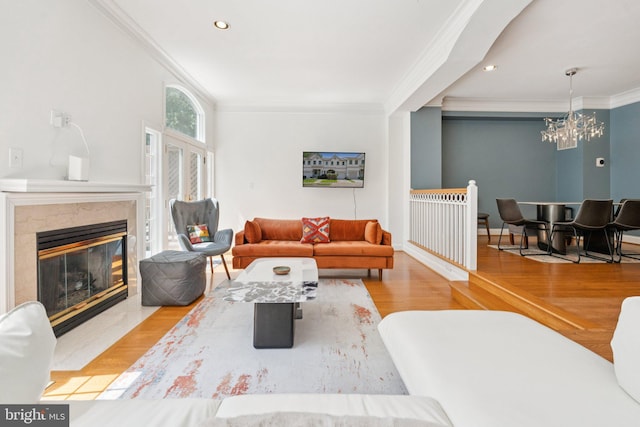 2009 Magarity Ct, Falls Church, VA 22043 - living area with wood finished floors, crown molding, a high end fireplace, a chandelier, and recessed lighting