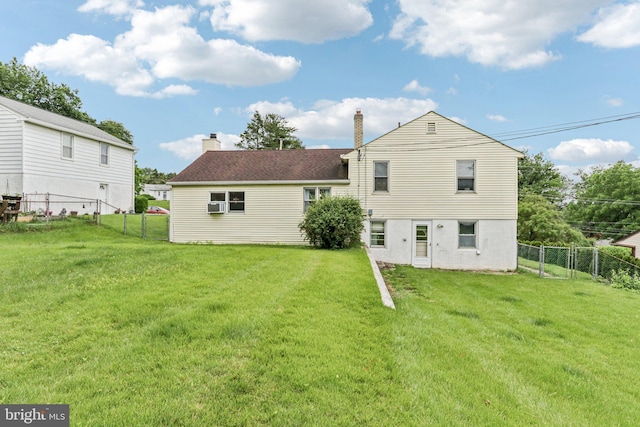 694 Davisville Rd, Warminster, PA 18974 - back of house featuring a fenced backyard, a chimney, and cooling unit