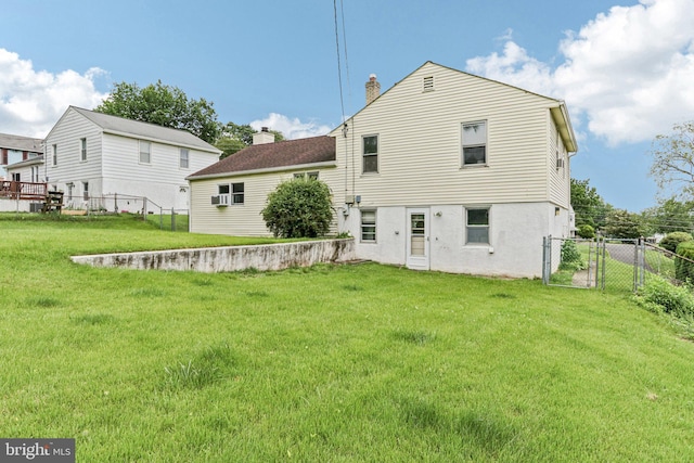 694 Davisville Rd, Warminster, PA 18974 - rear view of house with a chimney and a gate