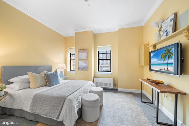 1701 Locust St Unit 2015, Philadelphia, PA 19103 - bedroom with carpet, crown molding, radiator heating unit, and multiple windows