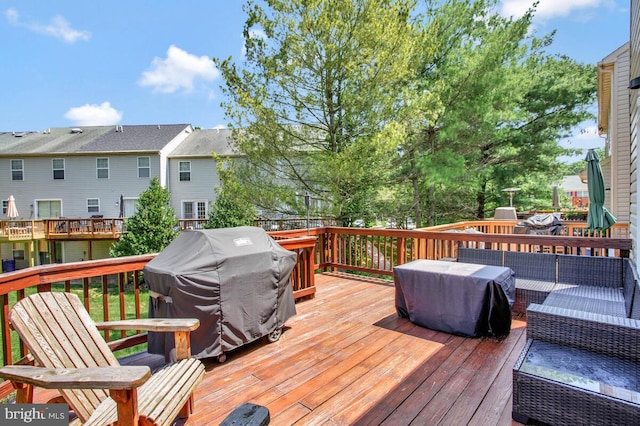 628 Talon Ct, Arnold, MD 21012 - wooden deck with grilling area and a residential view