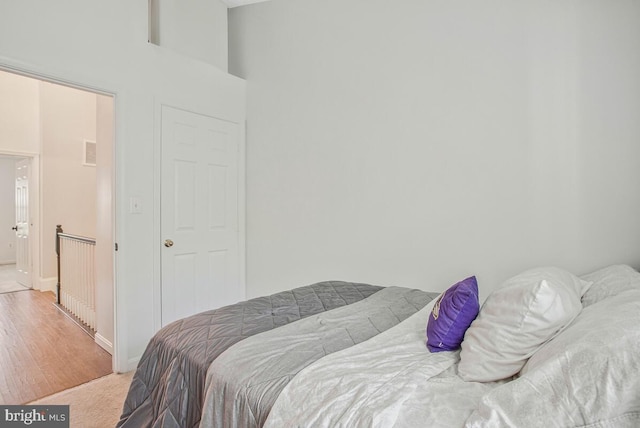 628 Talon Ct, Arnold, MD 21012 - bedroom featuring light colored carpet and a towering ceiling