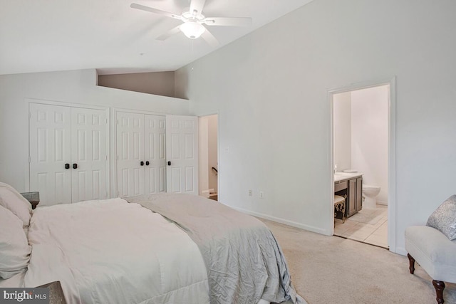 628 Talon Ct, Arnold, MD 21012 - bedroom with multiple closets, light carpet, connected bathroom, a ceiling fan, and high vaulted ceiling