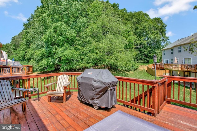 628 Talon Ct, Arnold, MD 21012 - wooden deck featuring a grill and a lawn