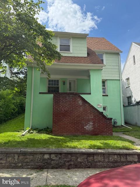 825 Gephart Dr, Cumberland, MD 21502 - view of front of home featuring a shingled roof and a front yard