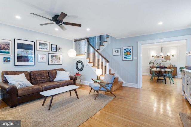 627 E Allens Ln, Philadelphia, PA 19119 - living room featuring light wood-style flooring, stairs, ceiling fan, and recessed lighting