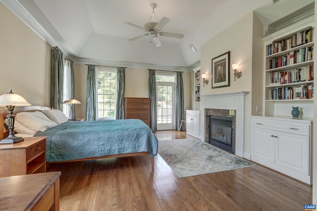 455 Foxdale Ln, Charlottesville, VA 22903 - bedroom with a fireplace, wood finished floors, lofted ceiling, and a ceiling fan