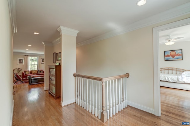 455 Foxdale Ln, Charlottesville, VA 22903 - hall with light wood-type flooring, crown molding, recessed lighting, and an upstairs landing