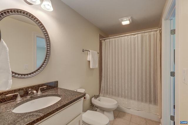 455 Foxdale Ln, Charlottesville, VA 22903 - bathroom with a bidet, vanity, tile patterned flooring, and shower / bath combo with shower curtain