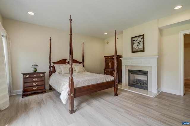 455 Foxdale Ln, Charlottesville, VA 22903 - bedroom featuring wood finished floors, recessed lighting, and a premium fireplace