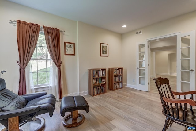 455 Foxdale Ln, Charlottesville, VA 22903 - living area featuring french doors, light wood-style floors, and recessed lighting