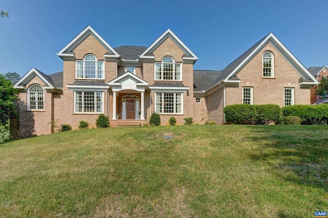 455 Foxdale Ln, Charlottesville, VA 22903 - traditional home with brick siding and a front lawn