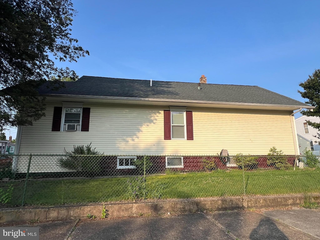 124 Penn St, Penns Grove, NJ 08069 - view of home's exterior featuring cooling unit and a chimney