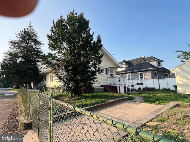 124 Penn St, Penns Grove, NJ 08069 - view of front of property with a deck