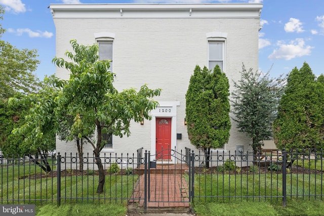 1200 6th St NE, Washington, DC 20002 - view of front of house with brick siding and a fenced front yard