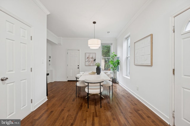 1200 6th St NE, Washington, DC 20002 - dining room featuring crown molding and dark wood-style flooring