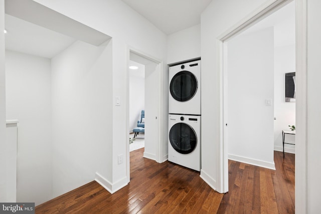 1200 6th St NE, Washington, DC 20002 - laundry room with stacked washing machine and dryer and hardwood / wood-style flooring