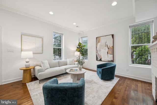 1200 6th St NE, Washington, DC 20002 - living room featuring ornamental molding, a brick fireplace, dark wood-type flooring, and recessed lighting