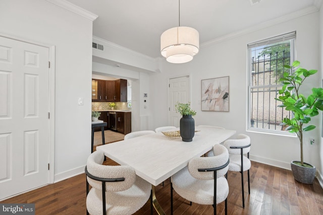 1200 6th St NE, Washington, DC 20002 - dining area featuring crown molding and dark wood-style flooring